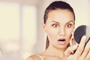 Dermomedic - ¿Por qué surgen las manchas en la cara?